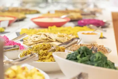 a table with many different types of food on it at Vegan Hotel La Vimea in Naturno