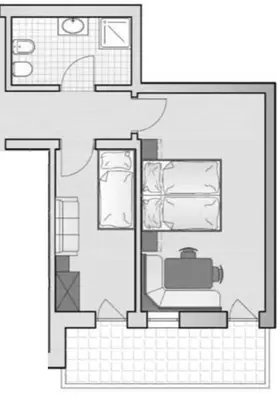 a floor plan of a bathroom with a toilet at Apparthotel Sellaronda in Arabba