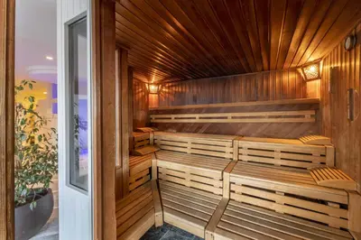 a ski lift on a snow covered ski slope at Ferien & Wellnesshotel Windschar in Brunico