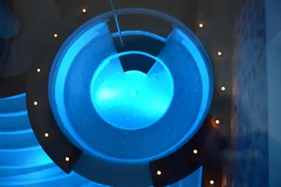 a blue bowl is on the ceiling of a room at Hotel Garnì Carpe Diem in Vigo di Fassa