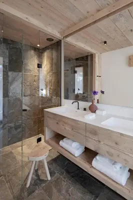a bathroom with a large tub and a shower at HOTEL de LEN in Cortina dʼAmpezzo