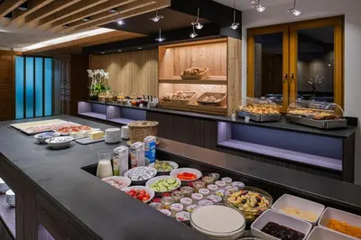 a buffet line with many different types of food at Moar's Hotel in Valdaora