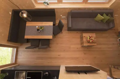 an overhead view of a living room with a couch at Greiterhof in Lana