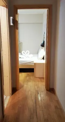 a room with a bedroom with a bed in it at Hotel Principe Marmolada in Malga Ciapela