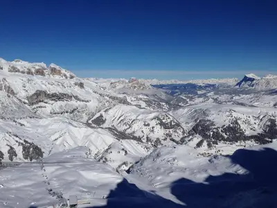 an aerial view of a snow covered mountain range at Garni Criss in Colfosco