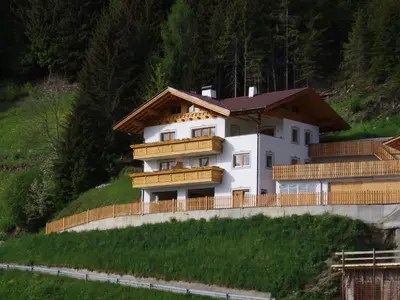 a house on the side of a hill at Thalerhof in Prenn