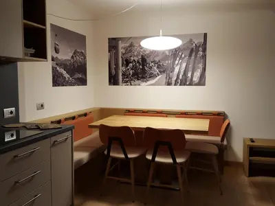 a bathroom with a sink and a bath tub at Residence Langes in San Martino di Castrozza