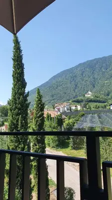 a view of a mountain from a balcony at Haus Sonnegg in Marlengo