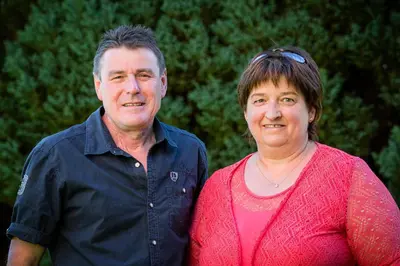 a man and a woman standing next to each other at Pension Haus am See in Naz-Sciaves