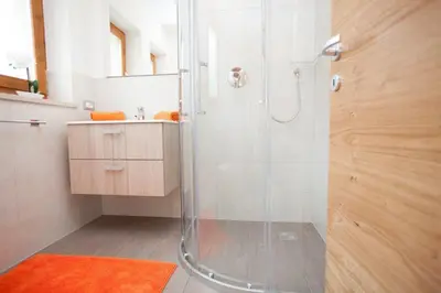 a bathroom with a shower and a sink at Appartement Bachguter in Avelengo