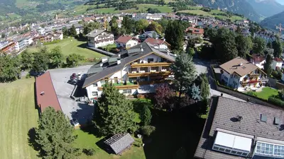 an aerial view of a house in a village at Hotel Hubertushof in Vipiteno