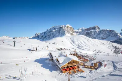 a ski lodge in the snow on a mountain at Rifugio Salei in Canazei