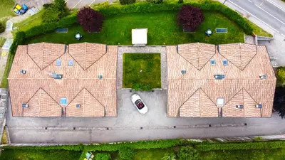 an overhead view of a house with a roof at Appartamenti Le Plejadi in Cavalese