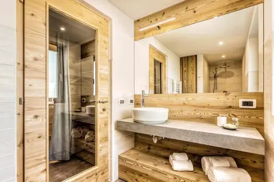 a bathroom with a sink and a mirror at Residence Telemark in Santa Cristina in Val Gardena