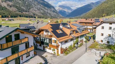 an aerial view of a village in the mountains at Bio.top.Appartement in Rasun di Sopra