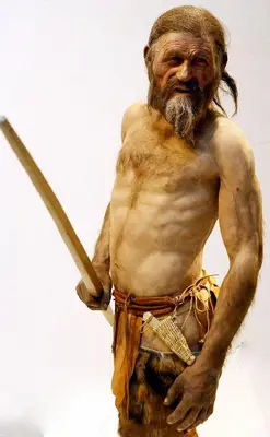a statue of a man holding two swords at Nel Cuore Verde di Bolzano in Bolzano