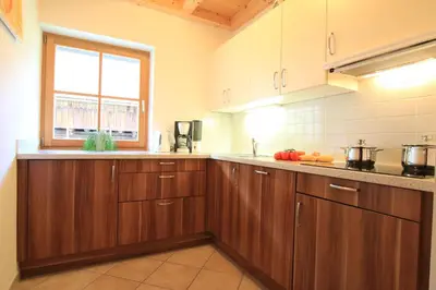 a bathroom with a shower and a toilet and a sink at Paalhof in Castelrotto