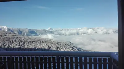 a view from a window of a mountain with clouds at Arche Hof Bichler in Gais
