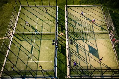 an overhead view of a group of people on a climbing exhibit at The Lodge Sporthotel - Golfclub Eppan in Appiano sulla Strada del Vino