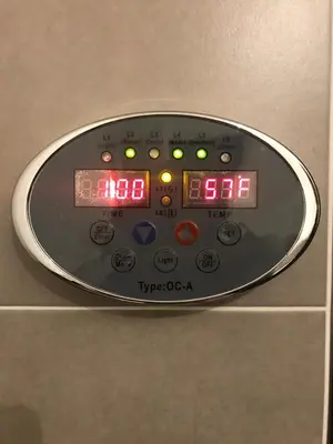 a close up of a digital clock on an elevator at Appartamento Piè in Canazei