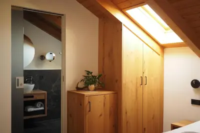 a bathroom with a sink and a mirror at Jägerheim in Vilpiano