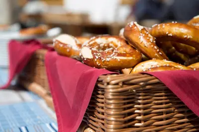 a basket filled with lots of different types of donuts at Unterer Obereggerhof in San Leonardo in Passiria
