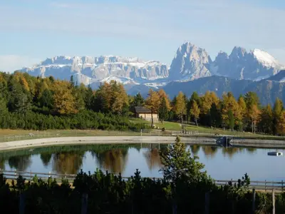 a view of a lake with mountains in the background at Malsethhof in Villandro