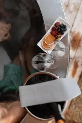 a close up of a plate with fruit on it at Valsegg Chalets Südtirol - luxury and private hideaway in Valles