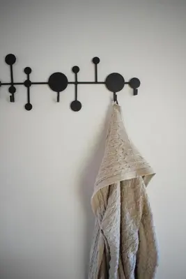 a towel is hanging on a wall at Landhaus Lina in Caldaro