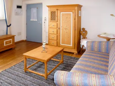 a living room with a coffee table and a couch at Apartment Bellavista by Interhome in Postal