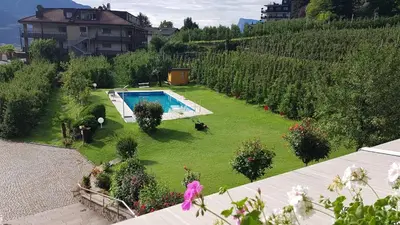 an aerial view of a garden with a swimming pool at Chalet Anna in Marlengo