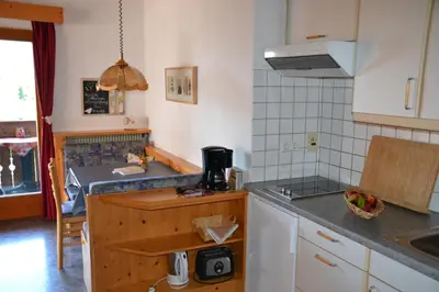 a kitchen with a sink and a counter top at Burggräflerhof in Lana