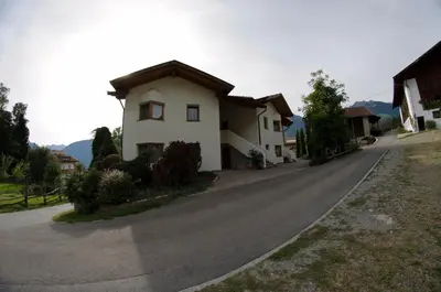 a house on the side of a road at Hammele Appartements in Schenna