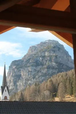 a view of a mountain from a window of a church at Natur Luch Sossach in La Villa