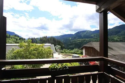 a view from the balcony of a house with mountains at Agritur Chelodi in Cavalese