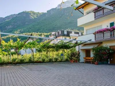 a balcony of a building with mountains in the background at Apartment Festenstein by Interhome in Andrian