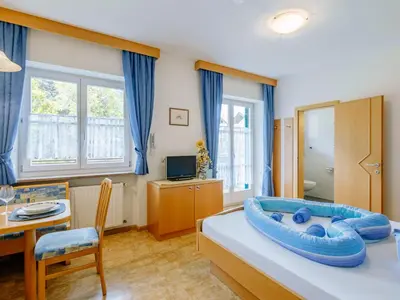 a room with a bed with a blue inflatable bed frame at Apartment Festenstein by Interhome in Andrian