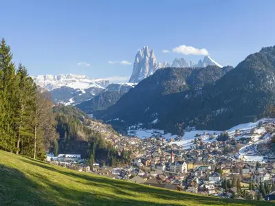 a town in a valley with mountains in the background at Apartment Tirol-2 by Interhome in Ortisei