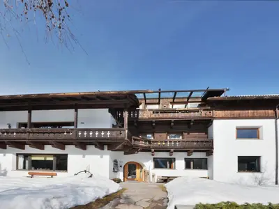 a house with flower boxes on the balconies at Apartment Tirol-3 by Interhome in Ortisei