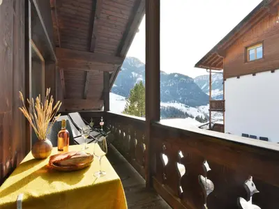 a kitchen with a table and a dining room at Apartment Tirol-3 by Interhome in Ortisei