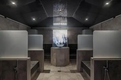 a room with a painting on the wall at Engel Gourmet&Spa in Nova Levante
