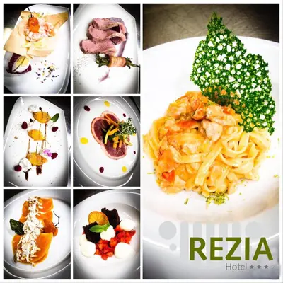 a collage of different pictures of food on plates at Hotel Rezia in La Villa