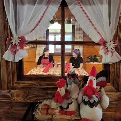 a group of stuffed animals sitting in front of a mirror at Agritur le Vale in Fiera di Primiero