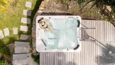an overhead view of a swimming pool with a dog in it at Christophs Hotel in Schenna