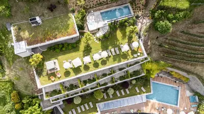 an overhead view of a building with a pool at Christophs Hotel in Schenna
