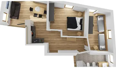a small apartment with a bedroom and a bed at Active Hotel Sonne in Gais