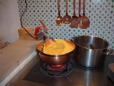 a pot on top of a stove in a kitchen at Rifugio Monti Pallidi in Canazei