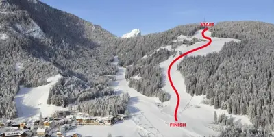 a ski run on a mountain with a red trail at Piccolo Hotel Claudia No Pets in San Vigilio Di Marebbe