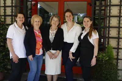 a group of women standing in front of a building at Hotel Tiffany in Merano