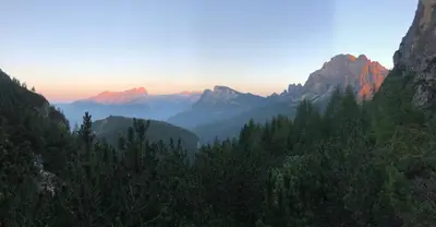 a view of a valley with mountains and trees at Telemark Mountain Rooms in Agordo
